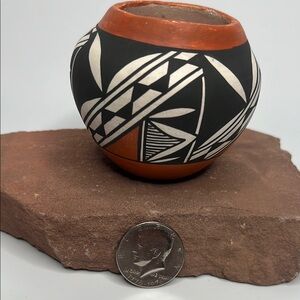 Handcrafted pottery bowl with Geometric designs.